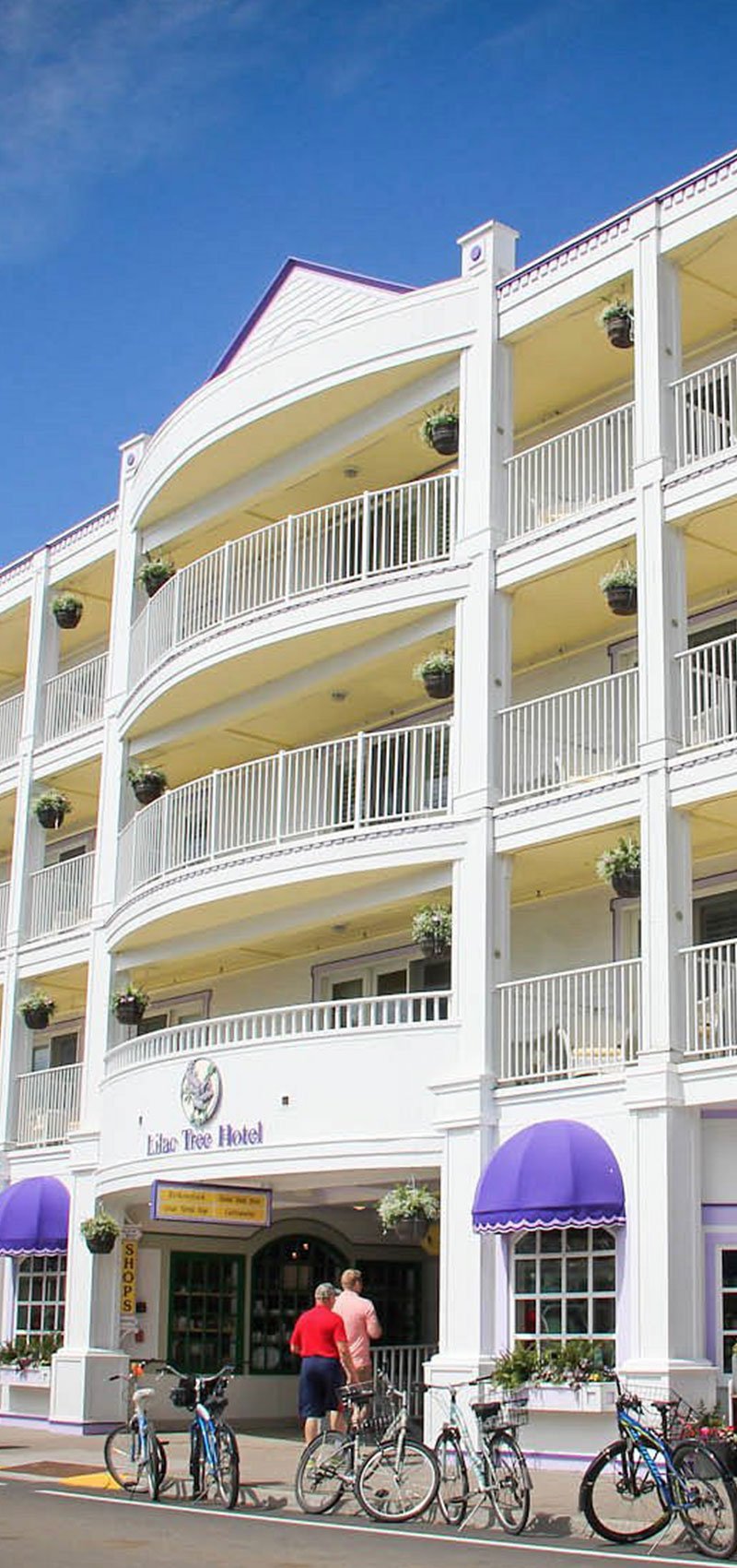 Lilac Tree Suites in the heart of Downtown Mackinac Island with balcony views of Main Street.
