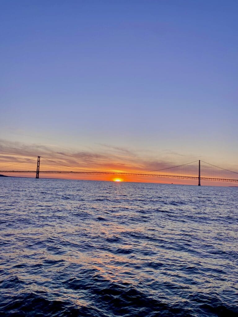 IMG_7669 sunset behind the mackinac bridge over lake huron