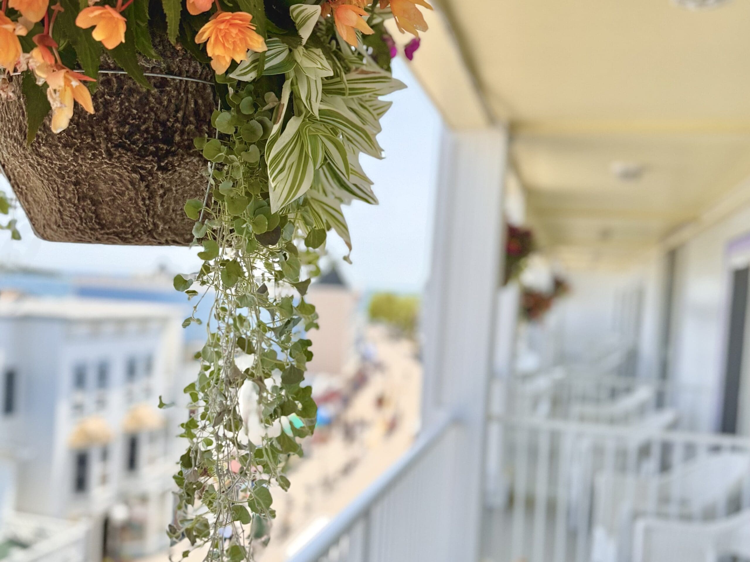 a balcony over looking main street on Mackinac Island during a peak summer day on Mackinac Island