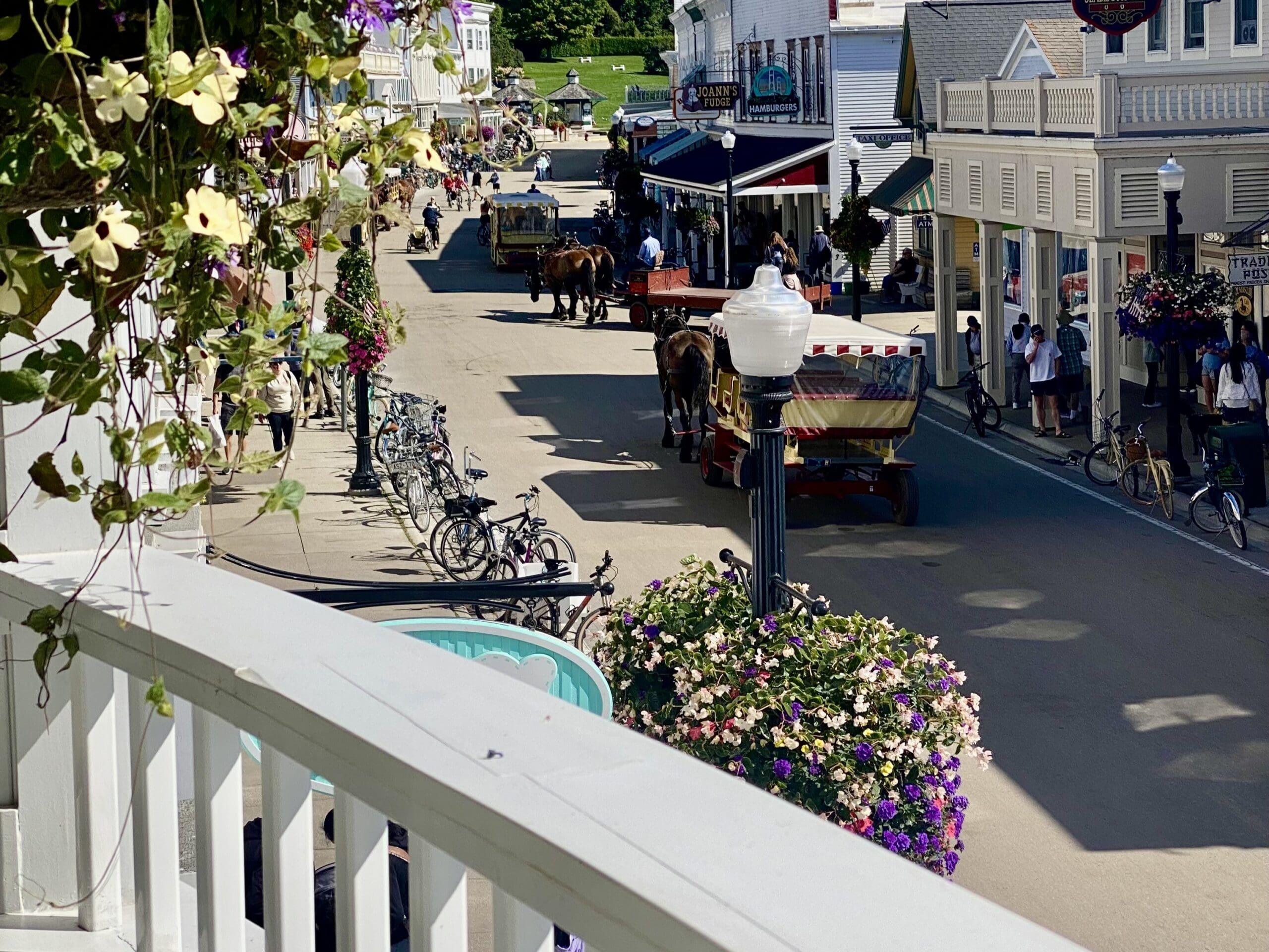 A balcony over looking main street showing the attractions and things to do during peak season